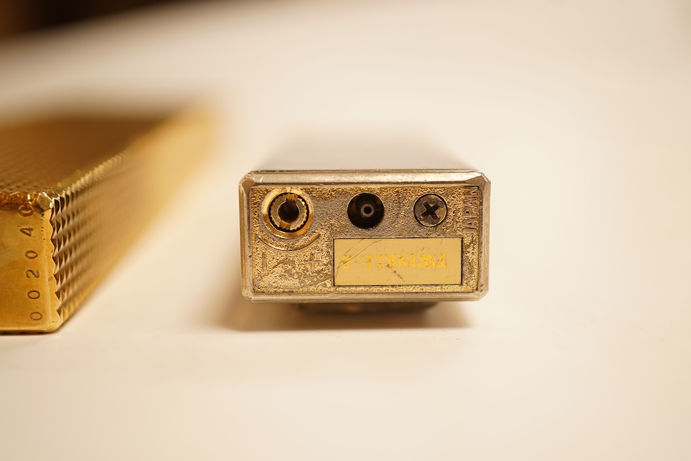 A Dupont table lighter and a ‘Twinkle 5’ lighter/timepiece